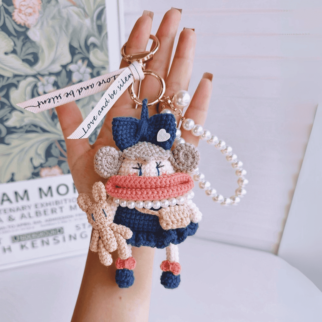 Rare Visual handmade doll keychain, dark blue crochet bag charm with big bow, pearl chain, and teddy bear accessory, cute handcrafted gift