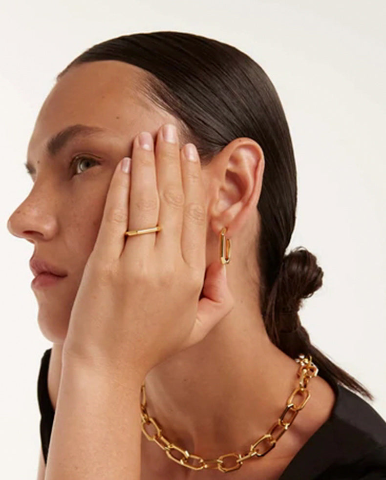 Gold Trendline Geometric Ring on model’s hand