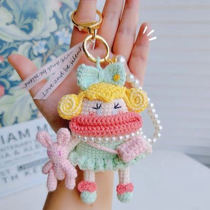 Hand hold a dopamine green Handcrafted Curly Collection Doll Bag Charm 